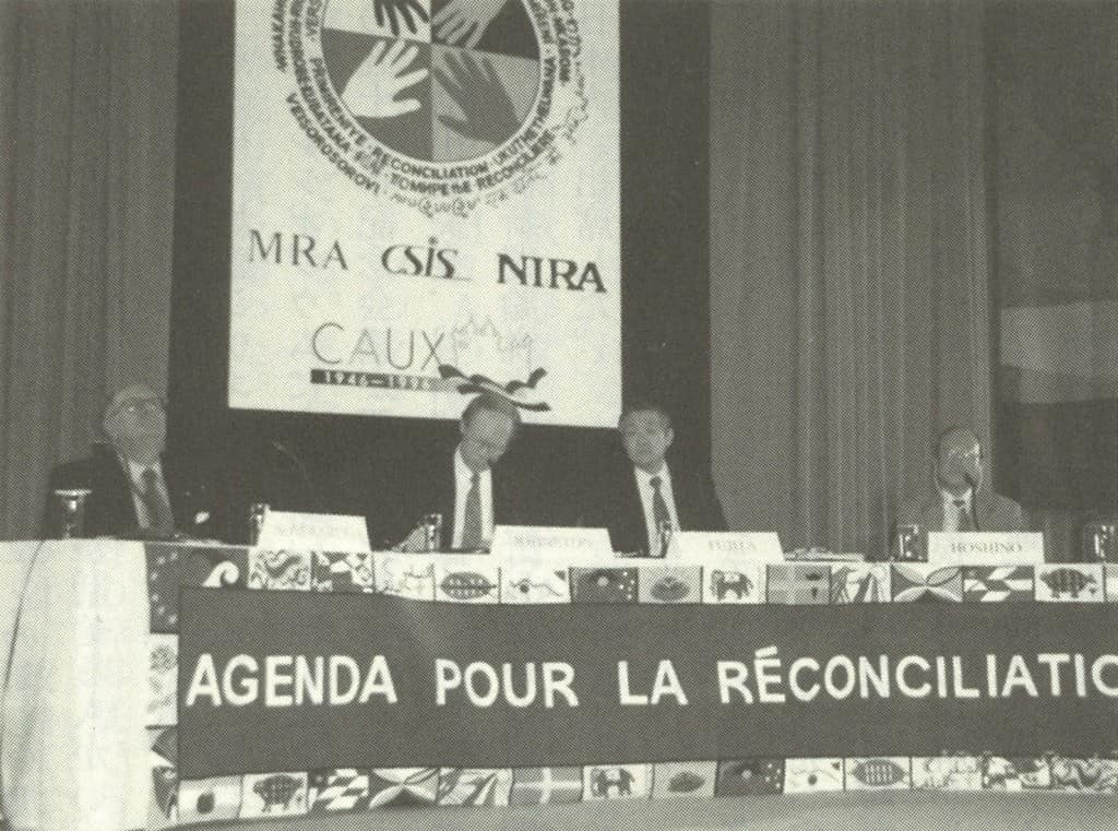 996 Initiating the symposium 'Agenda for Reconciliation' (from left) Cornelio Sommaruga, President of the International Red Cross; Doug Johnston, Vice President of the Center for Strategic and International Studies (CSIS); Yukihisa Fujita; and Nobuyasu Hoshino, Chairman of the National Institute for Research Advancement (NIRA) (Caux, Switzerland)
